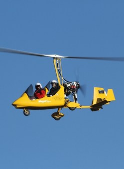 gyrocopter open air flight passenger smile