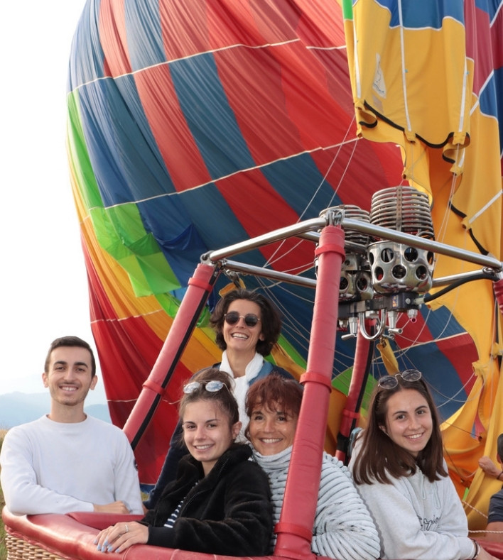 Family on board a hot air balloon private flight