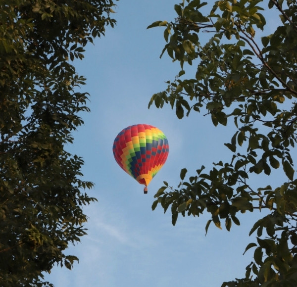 Privatized hot air balloon in flight