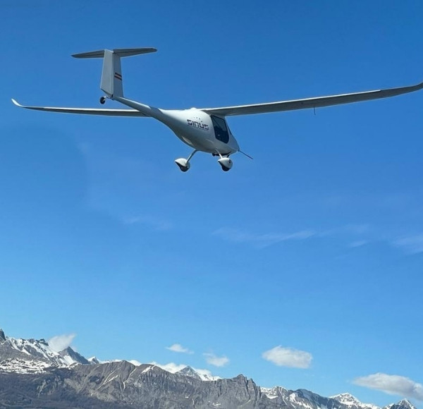 glider over the high alps summits