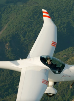 pilot and glider instructor in flight