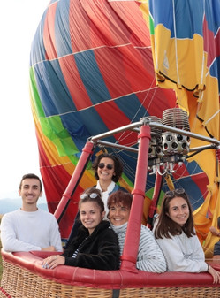 Passengers smiles hot air balloon basket