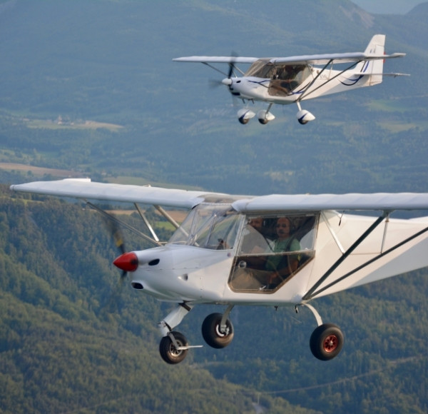 two white aircraft duo flight