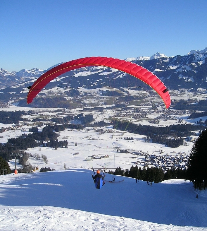 Winter paragliding flight in the Hautes-Alpes